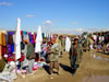 People Walking in Clothing Market